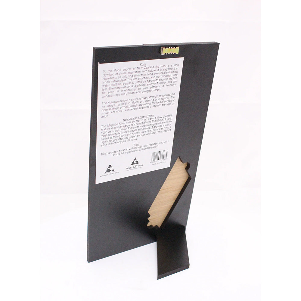 Back of Black stand with a description paper attached