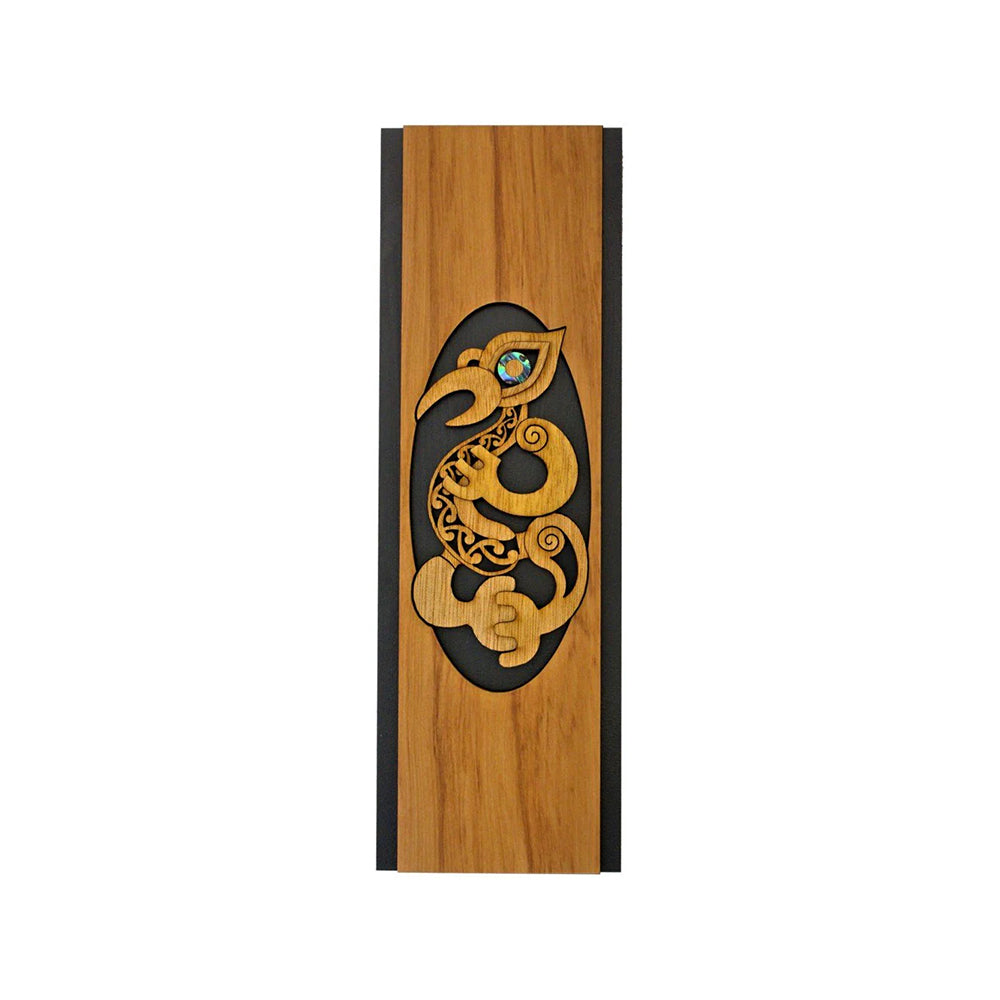 Wooden panel with a stylized dragon design on a white background