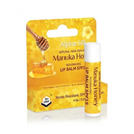 Alpine Silk Manuka Honey Nourishing Lip Balm SPF15 in a yellow packaging with a honey dipper illustration, indicating the product's key ingredients and water resistance.
