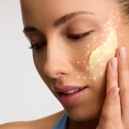 Woman applying a skincare product to her face with a close-up of the product.