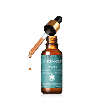 A bottle of Antipodes Hosanna H2O Intensive Plumping Skin Serum with a dropper, showing a few drops of the serum and a label that includes the brand name and product details.